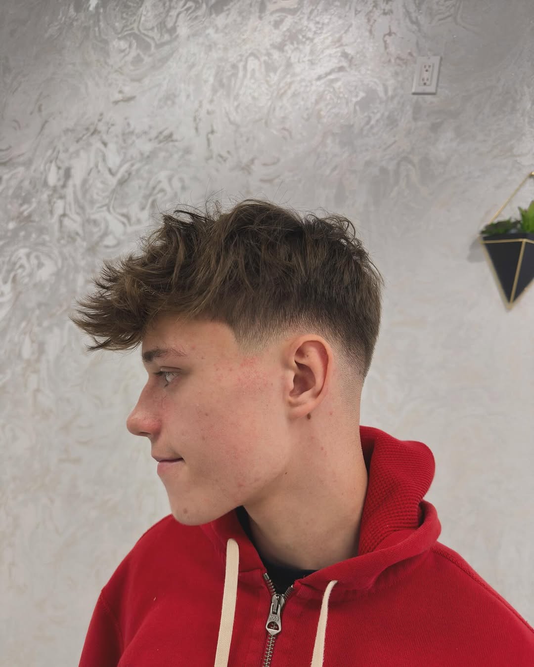 Textured crop with clean fade by Eleven Barbers Brooklyn